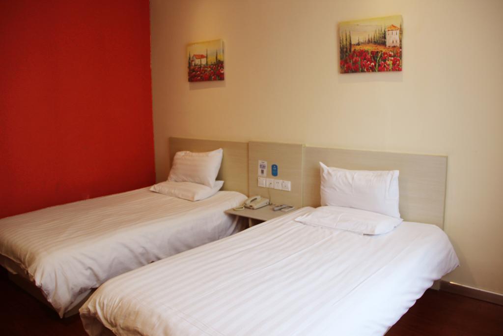 Hanting Hotel Changchun Qimao City Habitación foto